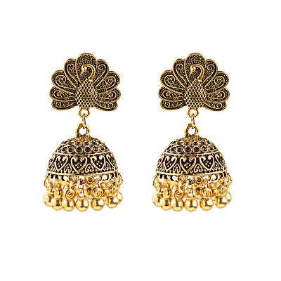 China BOHEMIA Gold Plated Alloy Drop Copper Bead Tassel Bohemian Hollow Embossed Stud Earrings Women Sun Flower Vintage Gypsy Earrings for sale