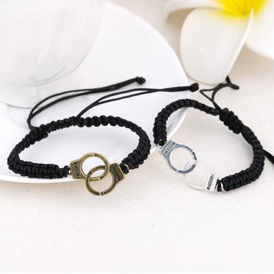 China CLASSIC Punk Classic Alloy Handcuff Bracelet For Women Men Adjustable Rope Handcuff Charms Braided Bracelet Cuff Jewelry for sale