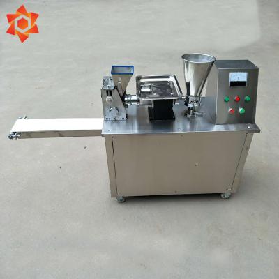 China Dunpling Making Machine Porcelain Automatic Samosa Dumpling Making Machine Steam Small Hand Dumpling Machine for sale