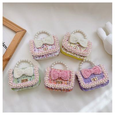 China Sweetly 2022 New Toddler Baby Kawaii Messenger Bag Children Kids Girls Small Cute Bowknot Pearl Princess Coin Purse Shoulder Bag for sale