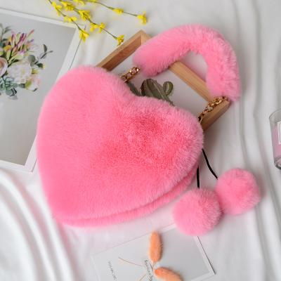 China Soft Valentine's Day Fur Heart Purse Luxury Fluffy Cross - Body Bag Colorful Heart Shape Fur Purse For Women Girls for sale