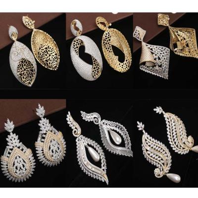 China 0-15717 new fashionable saudi gold jhumka earrings design with price for dangling drop earrings for sale