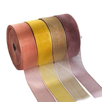 China Metallic rose pink sheer organza ribbon roll 25mm luster tulle ribbon for wedding invitation for sale