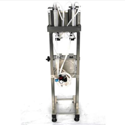 China YTK Automatic Double Pipeline Semi-automatic Perfume Filling Machine For Filling All Kinds Of Perfumes for sale