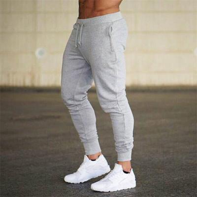 China Custom Logo Men's Fashion Sports Thin Pants Outdoor Fitness Running Pants Water Resistant for sale