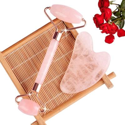 China Hot Amazon sales skin care tools custom 100% natural crystal facial face rose quartz roller gua sha jade roller for sale