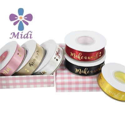 China Vivid Color Fastness Make A Wishes 15mm Gold Foil Silver Foil Custom Logo Printed Satin Ribbon Gift Ribbon for sale