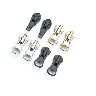 China 7# Thumb Slider Nickel Free Gold And Silver Plated High Quality Zipper Head For Jacket for sale