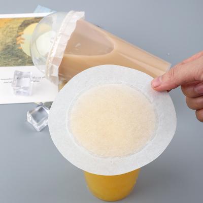 China Waterproof Milk Tea Leak-proof Paper Disposable Coffee Sealing Paper Drink Gasket Sealing Cup Film Takeaway Packaging Sealing film for sale