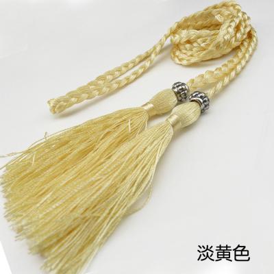 China Decorative Long Rope Belt Tassel Decorations Polyester Braided Rope Tassel For Dresses for sale