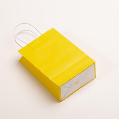 China Recyclable Colorful Bright Yellow Kraft Paper Bag Food Dessert Gift Wrapping Paper Gift Bag for sale