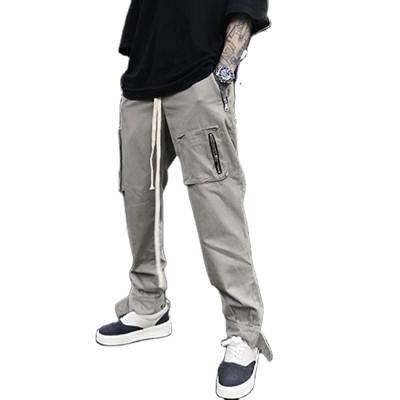 China OEM fmulti Pockets Zipper Waterproof Skateboard Jogger Solid Color Stretch Waist Men Straight Loose Cargo Pants for sale