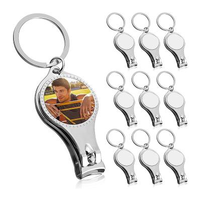 China Viable Wholesale Custom Sublimation Masks Keychains Metal Bottle Opener Nail Clippers Multifunctional Sublimation Keychains for sale