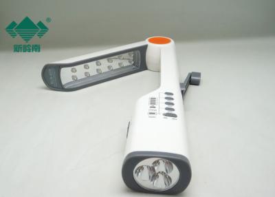 China Multifunctional Hand Crank Dynamo LED Lamp Solar Flashlight with Radio for sale