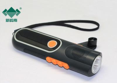 China Hand Powered Dynamo Flashlight Radio With Mobile Phone Charging For Emergency for sale