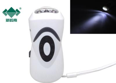 China Super Bright Hand Crank Led Flashlight Radio And Power Bank For Camping for sale