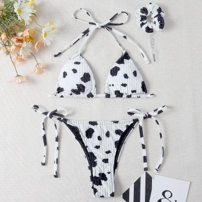 China High quality chain women cow strap waist cut thong beach bikini swimwear two piece set more printing for sale