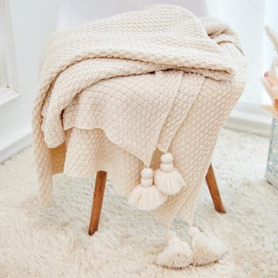 China PORTABLE custom design knit throw solid color plaid pattern tassel fluffy baby blanket for living room for sale