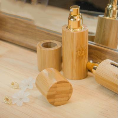 China New Sickness Perfume Glass Bottle Eco-Friendly Design With Wooden Box Packing Bamboo Skin Care Packaging for sale