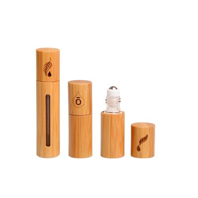 China Perfume; Inner Essential Oil Essential Oil Clear Glass With Natural Bamboo Wooden Shell Roll On Bottle for sale