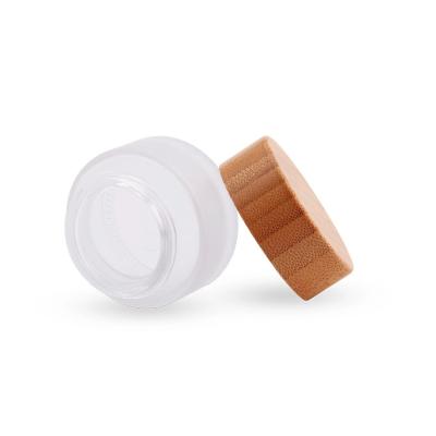 China 5g 15g 30g 50g 100g 150g drink clear/frosted glass jar with bamboo/wooden lid for body/hand/face cream glass cosmetic packaging jar for sale