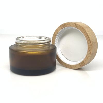 China Cosmetic Factory Wholesale Bamboo Jars 50ml Amber Jar With Bamboo Lid for sale