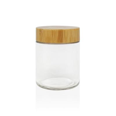 China CANDY Eco Container 4oz Bamboo Child Resistant Glass Jar With Bamboo Lid for sale