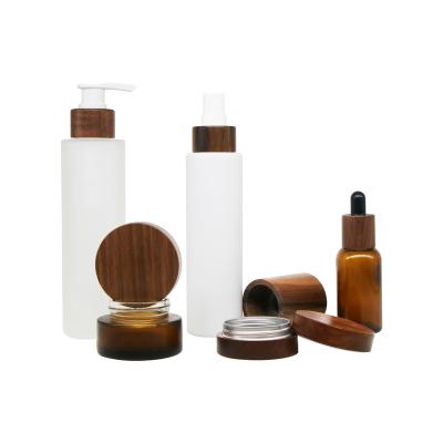 China Biodegradable Material Factory Customized Black Walnut Wooden Cosmetic Packaging Cosmetic Jar And Bottle for sale