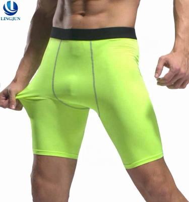 China Antibacterial Custom Elastic Tight Quick Dry Sweating Male Sportswear Fitness Gym Running Pants Short Pants for sale