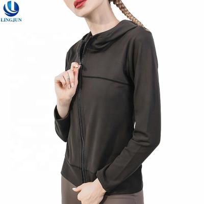 China New antibacterial yoga sports coat women's long sleeved zipper elastic running hooded bodybuilding jacket for sale