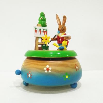 China Music Playing Easter Bunny Around Wooden Rotating Musical Music Boxes Gifts For Easter for sale