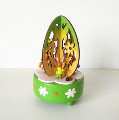 China Wrap Mechanism Around Flower Religious Crafts Easter Bunny Music Box Wood For Presents for sale