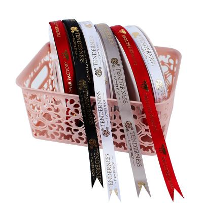 China Wholesale Custom Logo Design Wrapping Ribbon Raised Grosgrain Ribbon 2.5cm High Tenacity Gold Foil for sale