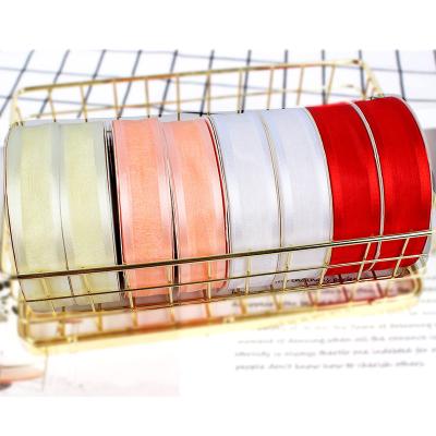 China Factory wholesale custom high tenacity ribbon roll organza ribbon glitter ribbon for sale