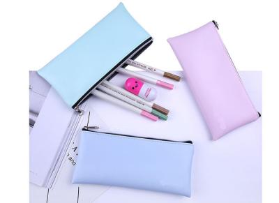 China Plain color student pen bag female simple large capacity PU handbag makeup bag for sale