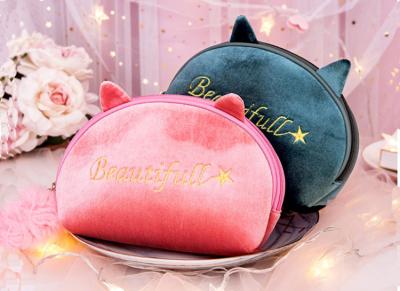 China Web celebrity small portable cute girl instagram style super fire goods large capacity plush makeup bags for sale