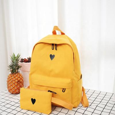 China Canvas Splashproof Fabric And Printed Heart Backpack Fashion School Backpacks Bags for sale