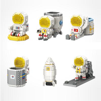 China Multifunctional Building Block Micro Pen Holder Astronaut Toys Blocks Building Blocks Multifunctional Toys For Children With LED Light for sale