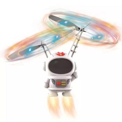 China Promotional Gifts for Kids - Pink/Blue/White Space Robot with LED Lights - Induction Flight RC Toy T1-10 for sale