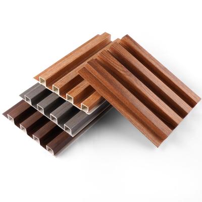 China Modern Modern Design Eco-Friendly Wooden Grain Fluted PVC Wall Panel Waterproof Interior Decorative Building Material for sale