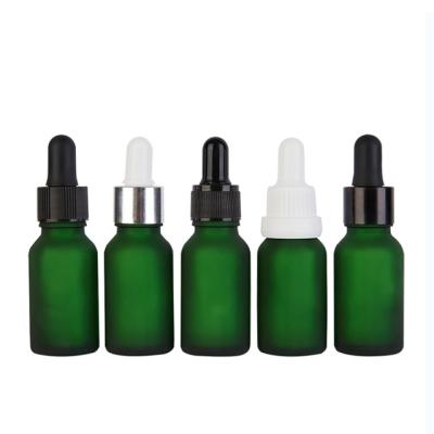 China Personal Care 15ml Frosted Green Glass Bottle With Gold And Silver Dropper Lid And Child Safety Lid for sale