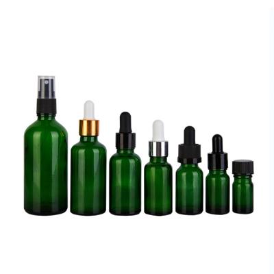 China Various Size 5ml 10ml 15ml 20ml 30ml 50ml 100ml Cosmetic Green Essential Oil Dropper Glass Bottle for sale