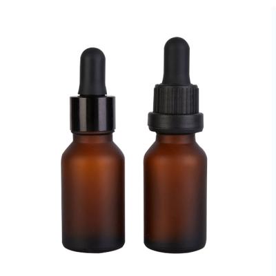 China 15ml cosmetic frosted amber glass cosmetic serum bottle with black dropper cap for sale