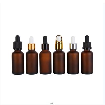 China 30ml cosmetic frosted amber glass cosmetic serum bottle with black dropper cap for sale