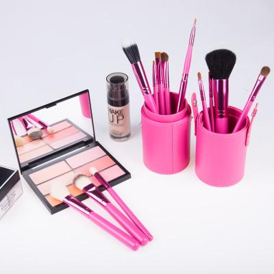 China Angular Blush Wholesale 12pcs Private Label Cosmetic Brush Kit Makeup Brush Set Tool Professional Custom Face Powder Base With Stand for sale