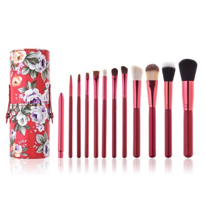 China Angular Blush in 12pcs Running Makeup Brush Set with Holder Professional Private Label Base Powder Cosmetic Facial Brush Kit for sale