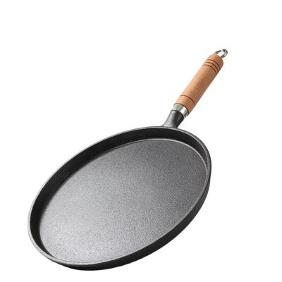 China Kitchen Restaurant Outdoor Bakery Chef-cookwares High Quality Non Stick Home & Restaurant Round Pre-seasoned Die Cast Iron Cookware Pizza Pan  with Wooden Handle for sale