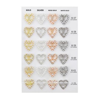 China LUXURY BRAND LOGO k57-62  nail parts metal pearl material Gold Silver Platinum Rose Gold Japan korea heart shape metal logo nail art decoration for sale