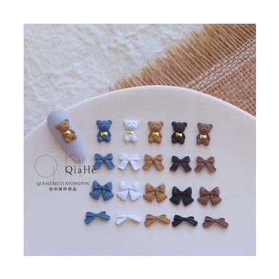 China Alloy 2023 Autumn Bowtie Cub 3D Frosted Metal Simple Coffee Color Bowtie Ribbon Nail Versatile Nail Decoration for sale