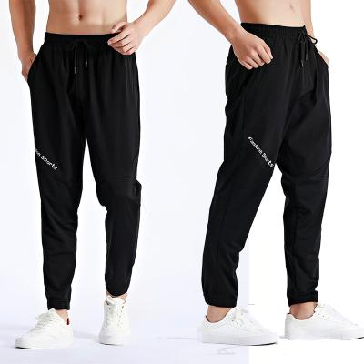 China European and American men's anti-static tracksuit pants outdoor running fitness balance color link foot quick-drying breathable tracksuit for sale